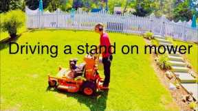 How to operate a stand on mower.