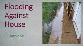 Cutting a swale to relieve driveway and crawlspace flooding