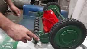 How to adjust the manual lawn mower  cutting height